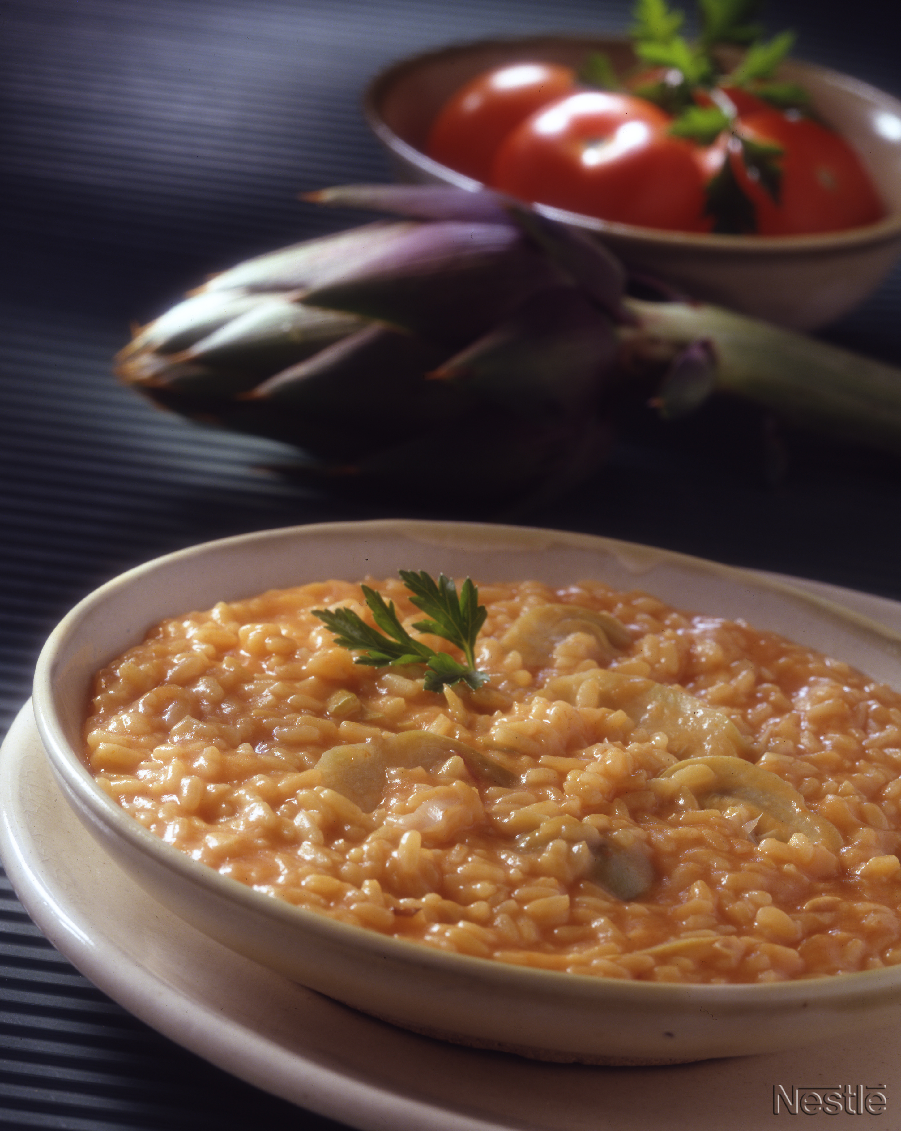 Risotto de tomate, alcachofas y queso idiazábal