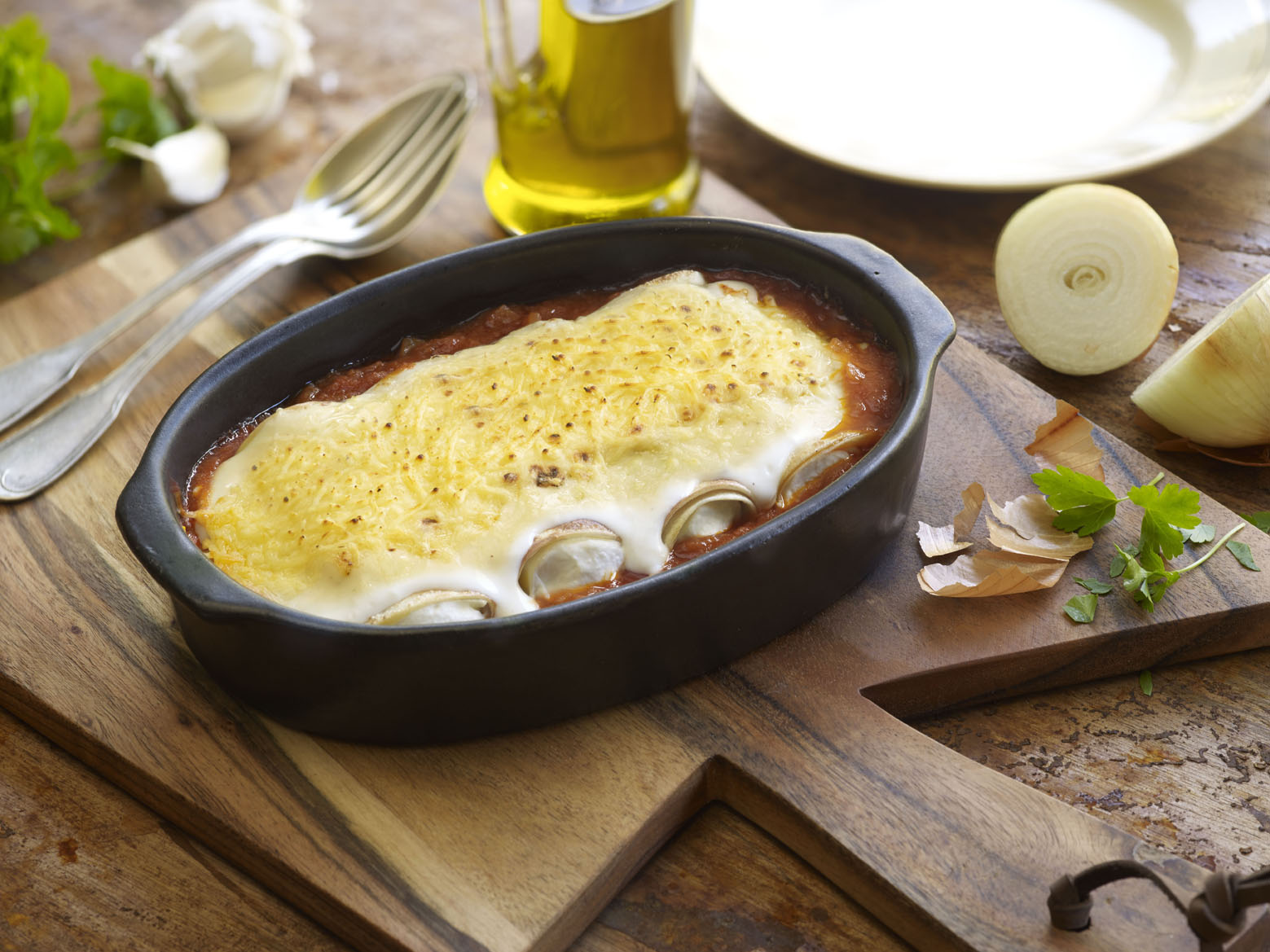 Canelones de requesón con salsa de tomate