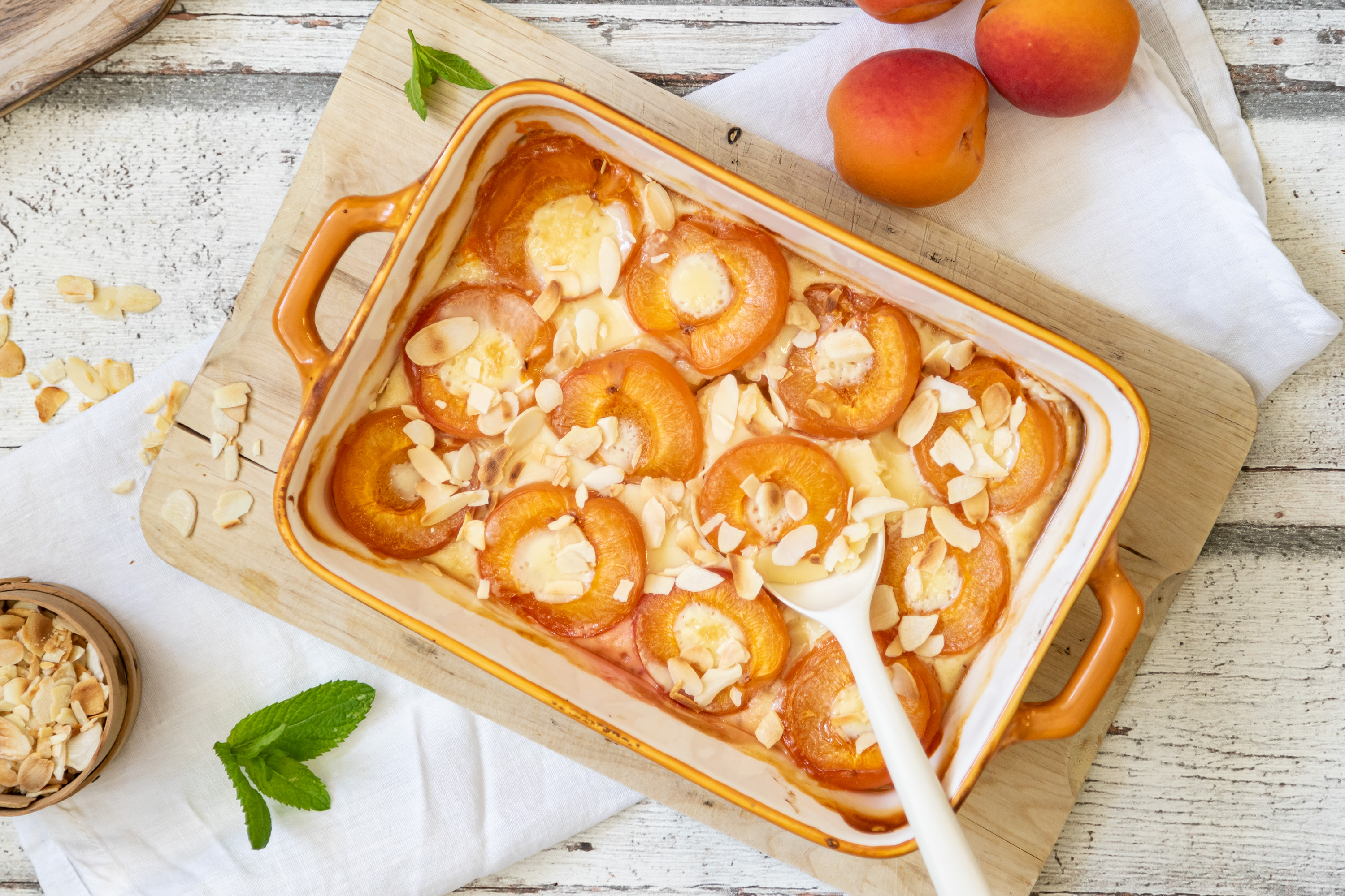 Albaricoques gratinados con leche condensada