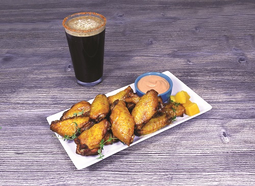 Dip de mango chipotle para alitas de pollo con sazonador sabor limón