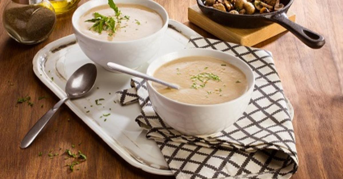 Creamy mushroom soup with NESTLÉ® CARNATION® milk and MAGGI® bouillon, garnished with fresh epazote.