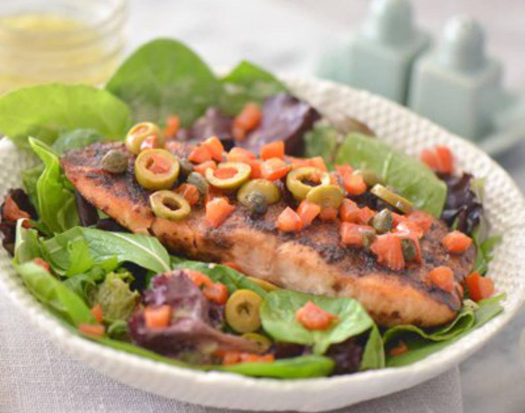 Veracruz Style Salmon On A Bed Of Greens 