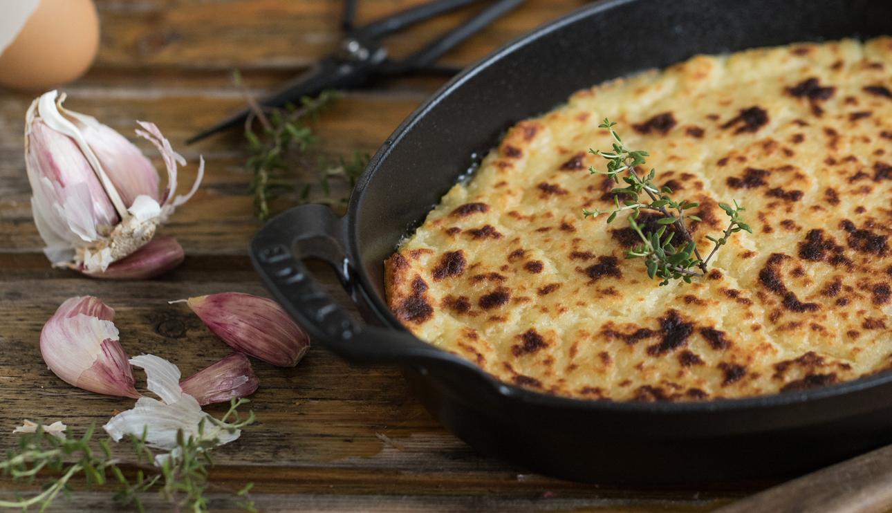 Gratinado de patatas y bacalao a la crema