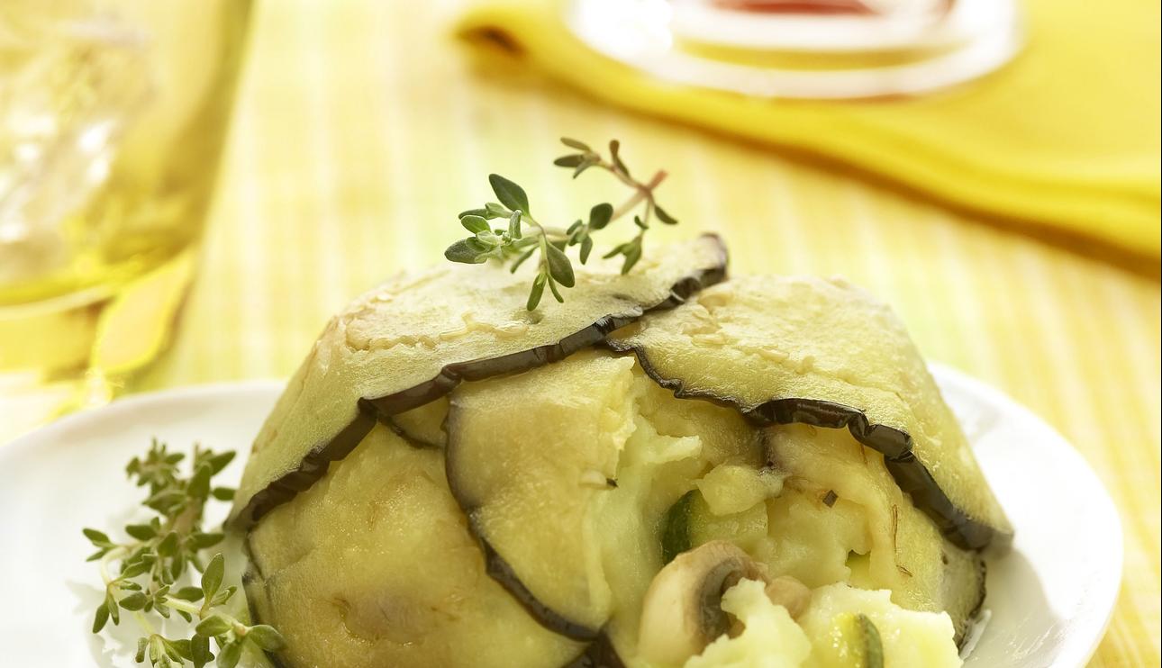 Flanes de berenjena y puré de patatas, rellenos de verduras