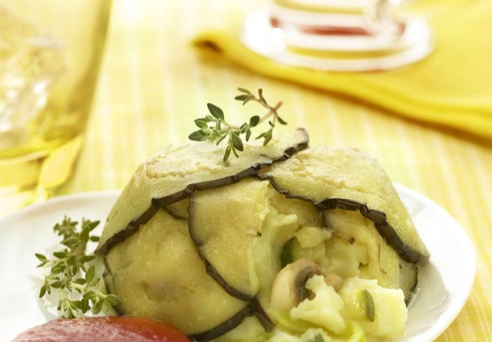 Flanes de berenjena y puré de patatas, rellenos de verduras