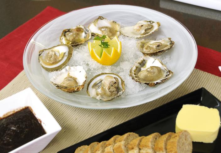 Ostras con salsa de vino