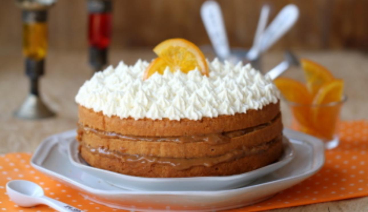 Tarta de dulce de leche, naranja confitada y coco