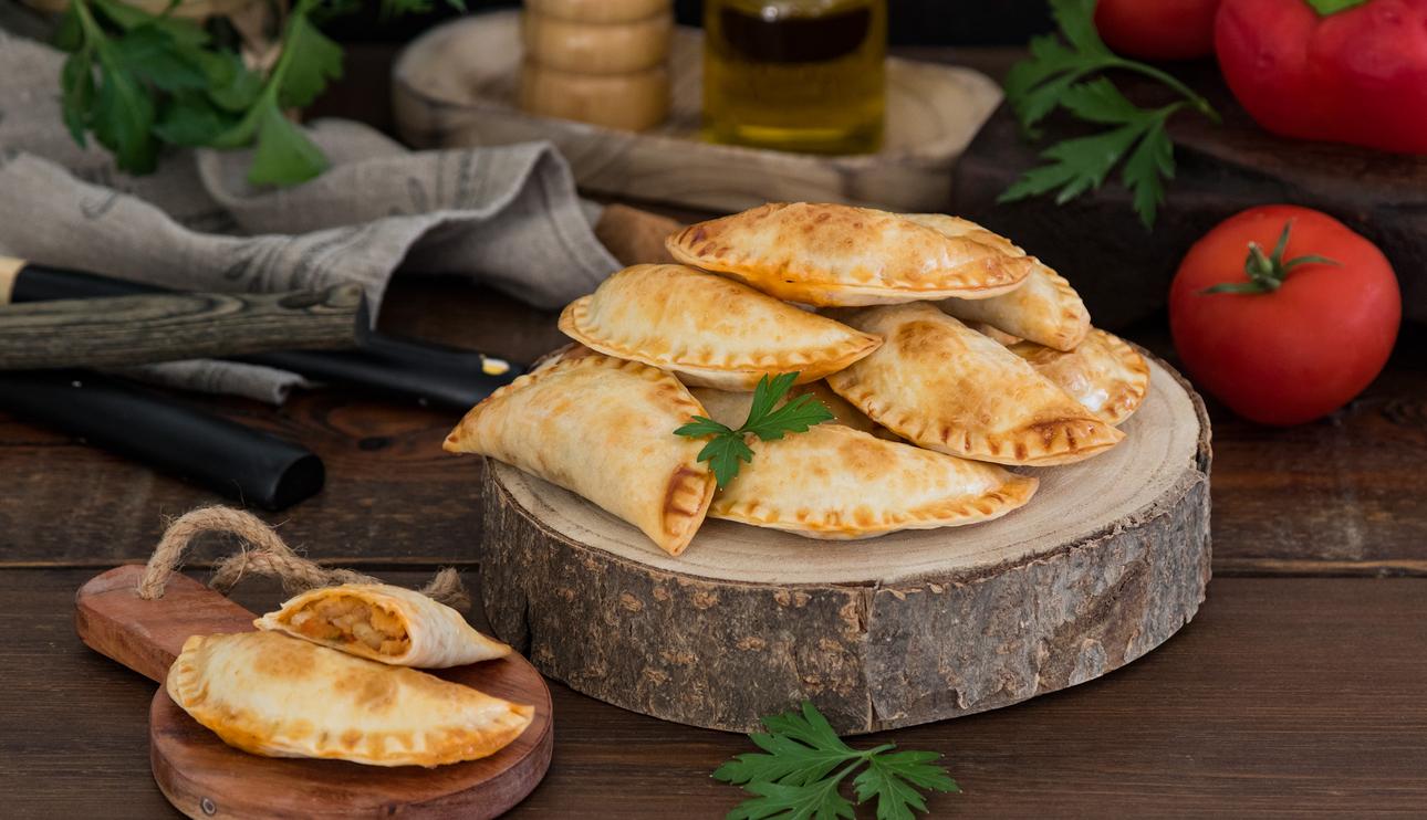 Empanadillas de bacalao al horno con tomate y verduras