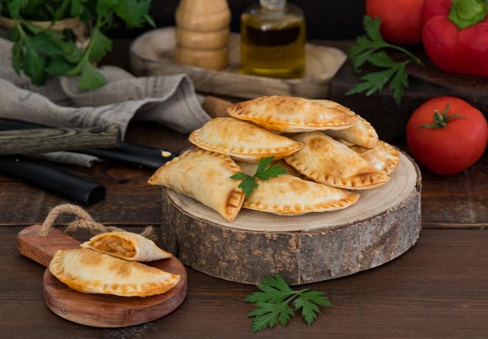 Empanadillas de bacalao al horno con tomate y verduras
