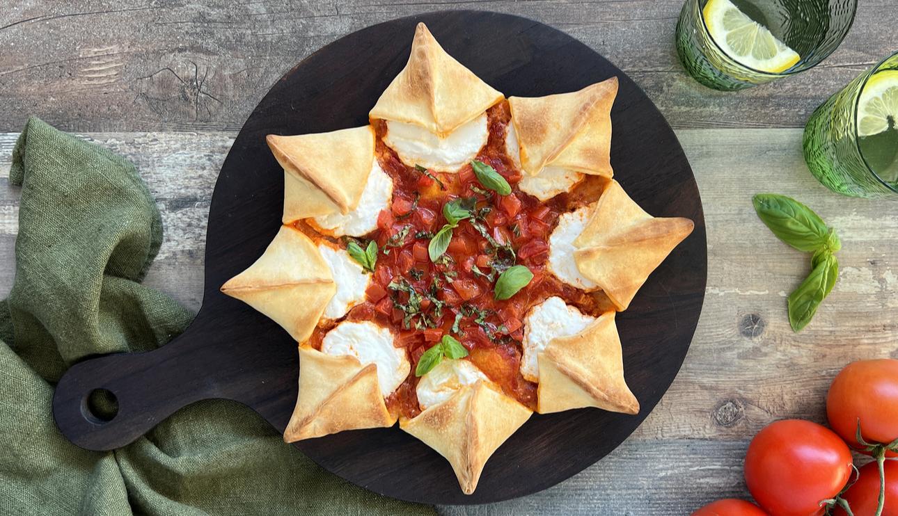 Pizza estrella de ricotta, tomate y albahaca