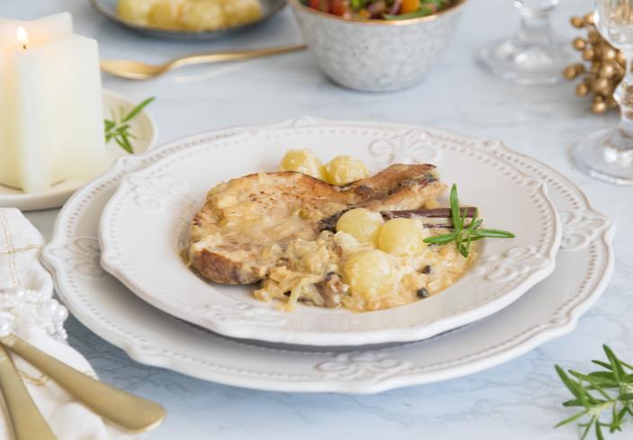 Chuleta de cerdo con salsa de uvas con cava