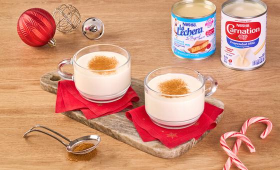 Rice Pudding Atole by LA LECHERA®, made with CARNATION® Evaporated Milk and Sweetened Condensed Milk, served in a bowl.
