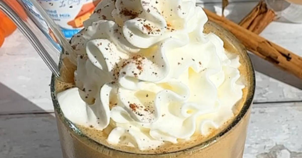 Iced Spanish Pumpkin Latte with La Lechera Sweetened Condensed Milk, ice, and pumpkin spice garnish.