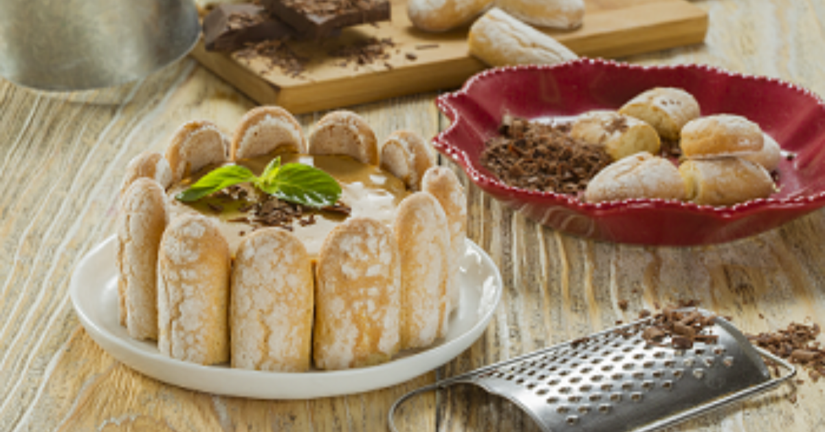 Dulce de Leche Coffee Charlotte by MEDIA CREMA, with ladyfingers, dulce de leche, coffee cream, and grated chocolate.