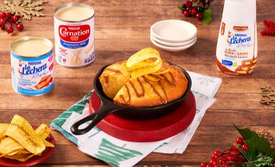 Banana Skillet Cake by LA LECHERA®, made with CARNATION® Evaporated Milk and topped with LA LECHERA® Dulce de Leche.