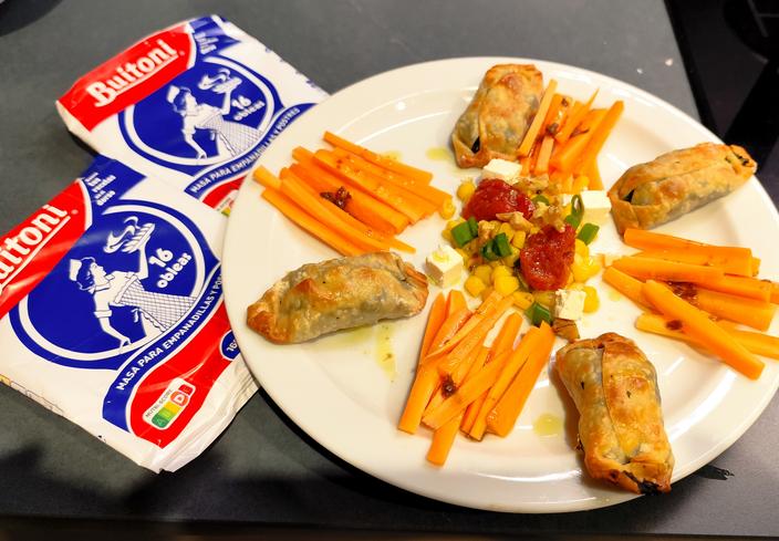 Panadons de espinacas con pasas y piñones de Montse Benito de Barcelona (Barcelona)