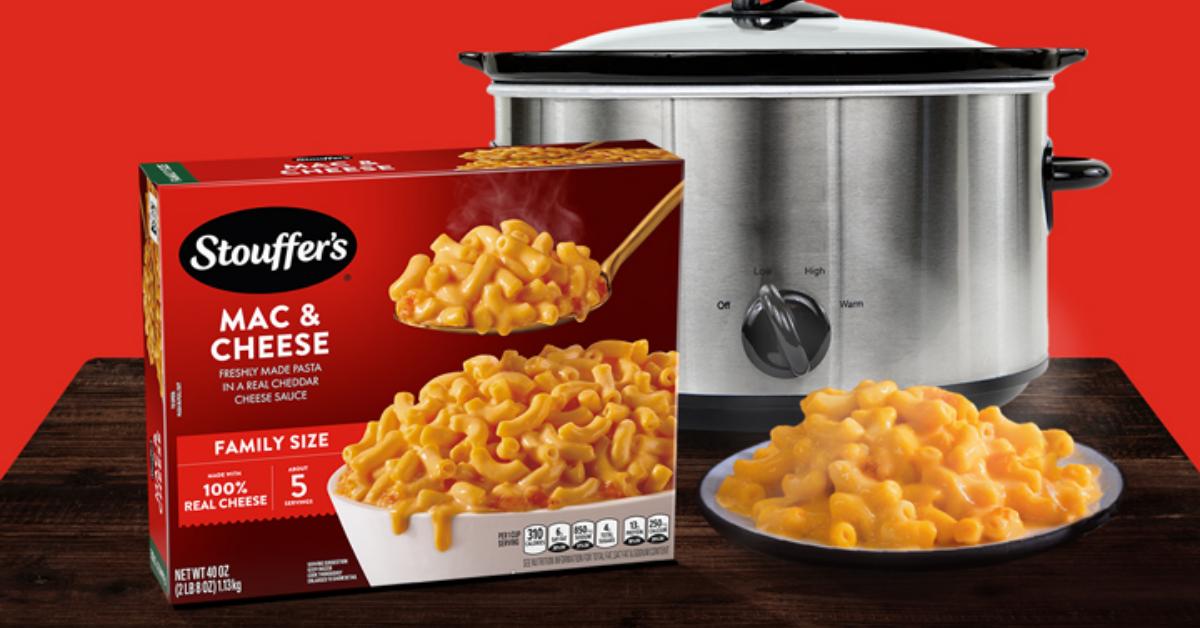 Photograph: Stouffer's Mac &amp; Cheese box, bowl of macaroni, and stainless slow cooker on red